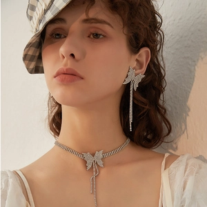 Sparkling rhinestone butterfly necklace and earring set with elegant long tassels