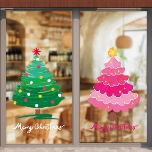 Colorful hand-drawn Christmas tree window stickers in green and pink for shop holiday decor
