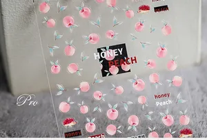 Close-up of peach and hedgehog nail stickers with a transparent background and soft colors