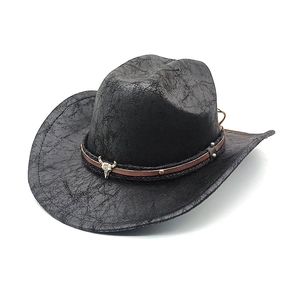 Black western cowboy hat with distressed texture and silver bull skull buckle decoration