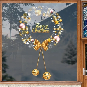 Golden Christmas wreath window sticker with Merry Christmas text and bells on glass