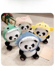 Detailed close-up of shark and dinosaur themed plush panda dolls on a soft carpet
