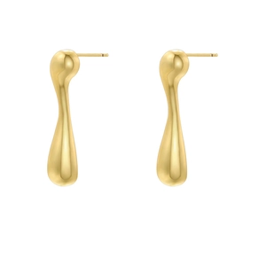 Close-up of golden teardrop earrings with a smooth polished metallic mirror finish