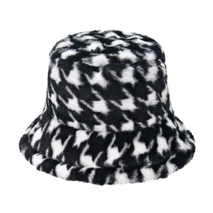 Classic houndstooth plush bucket hat for winter featuring black and white warm faux fur