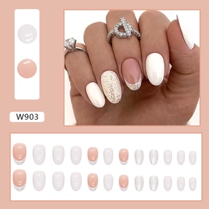 Short oval creamy white press-on nails set with silver glitter french tips and gradient