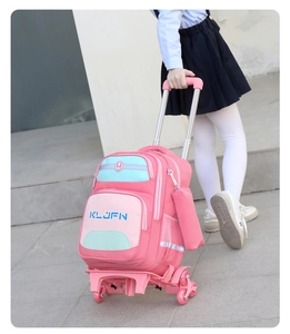 Pink and blue trolley school bag with six wheels being pulled up stairs by a girl