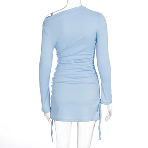 Detail of light blue ribbed knit dress showing side drawstring and ruched texture back