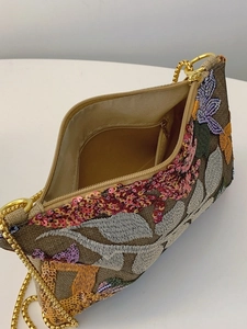 Elegant sequined evening clutch bag with floral embroidery and golden chain strap