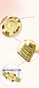 Detail of gold quartz watch with diamond accents and faceted glass dial display