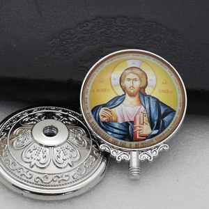 Detail showing Orthodox icon medallion with Jesus Pantocrator and silver ornate metalwork