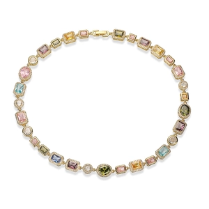 Luxurious gold-plated necklace with colorful geometric gemstones in a circular display