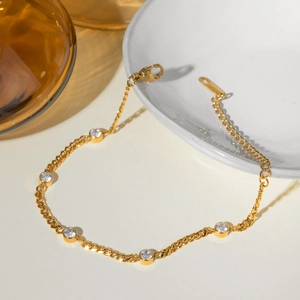 Classic 18k gold-plated stainless steel bracelet with five round zircon crystals