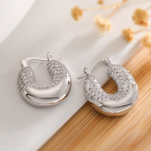 U-shaped 18K gold plated silver earrings with pavé zircons and a polished mirror finish