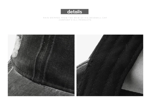 Close-up of distressed brim stitching and washed canvas texture on a black vintage baseball cap