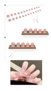 Detailed view of colorful press-on nails with heart patterns and wavy pastel candy designs