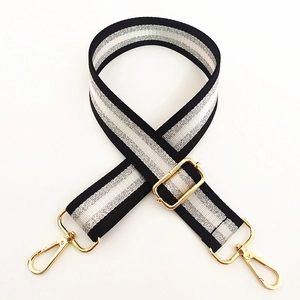 Adjustable wide replacement shoulder strap with black and white stripes and gold hooks