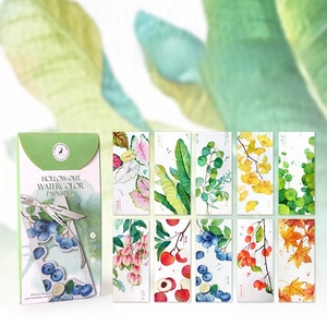 Close-up of 10 DIY watercolor bookmarks with plant illustrations and an elegant envelope