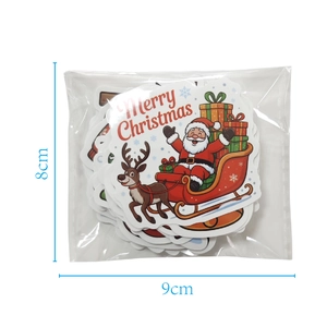 Detail view of Merry Christmas stickers in packaging with 8cm by 9cm dimensions