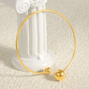Polished 18k gold stainless steel open choker necklace with asymmetrical bead details