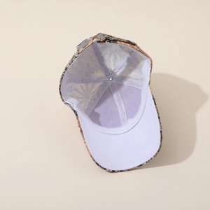 Top view of 100% cotton floral baseball cap showing internal lining and stitching