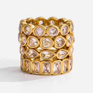 Set of four 18K gold-plated stainless steel stackable rings with sparkling white zircons