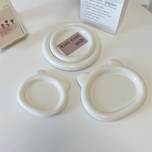 Minimalist white ceramic round and bear shaped snack trays set for home decor