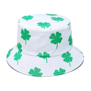 Detailed view of St. Patrick's Day bucket hat with green shamrock prints and brim stitching