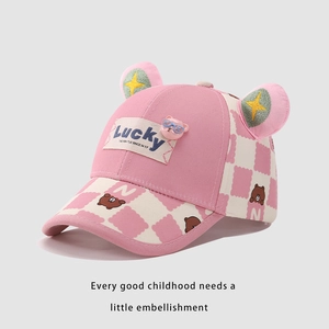 Detail of pink and beige kids baseball cap with 3D animal ears and cartoon pig decor