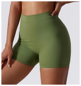 Detail of high-waist yoga shorts in olive green with seamless tummy control design