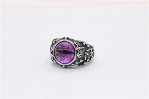 Gothic men's ring featuring a large purple dragon eye gem and side bat engravings