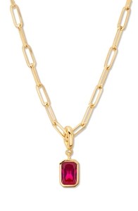 Close-up of 18K gold-plated paperclip chain necklace with rectangular red gemstone pendant