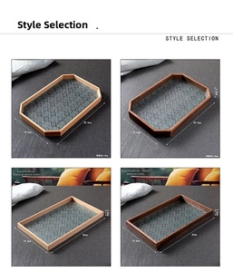 Detail showing four styles of vintage wooden trays with begonia embossed glass bottoms