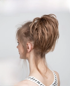 Brown Blonde messy bun hair extension shown before and after on model for volume