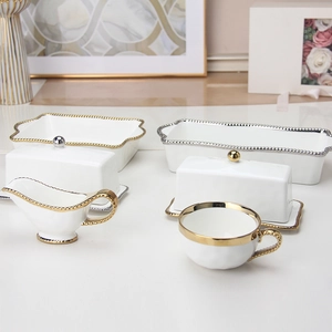Elegant beaded ceramic dinnerware set with gold rim for steak, salad and dessert
