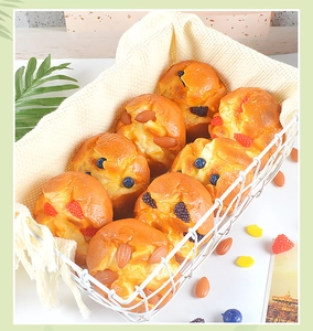 Detailed set of 8 realistic artificial muffins in a white iron basket with linen cloth