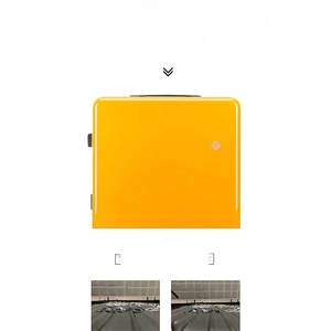 Close-up of waterproof vinyl stickers applied on a smooth yellow suitcase surface