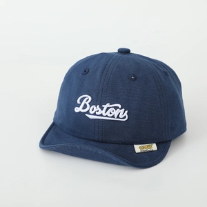 Close-up of navy blue cotton kids baseball cap with white Boston embroidery detail