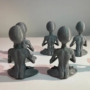 Meditating alien resin figurines in grey, back view of 5-piece 3D printed garden statues