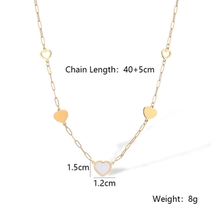 Detail shot of gold heart necklace showing measurements 40+5cm chain and 1.5cm pendant