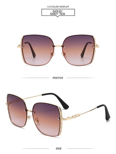 Detail view of square metal sunglasses with rhinestone edges and gradient lenses
