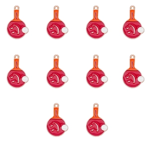 Detail showing red ping pong paddle pendants with alloy gold plating and white ball