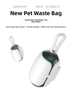 Detail of portable egg-shaped pet waste bag dispenser with hook in white and green matte finish