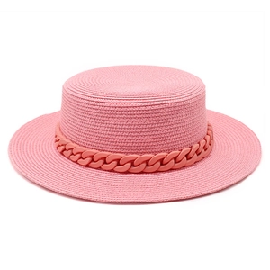 Pink flat top straw hat for women with chunky chain decor for summer beach vacations