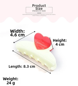 Detailed size chart for the cream hair claw clip featuring a glossy red heart design