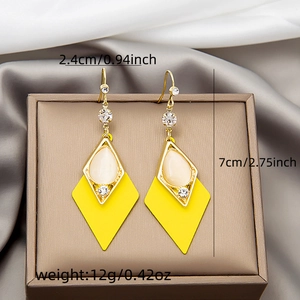 Detailed size view of tulip cat-eye stone earrings showing 7cm length and 12g weight