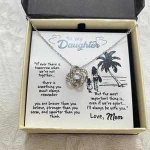 Love knot pendant necklace for daughter with message card in cream flip-top gift box