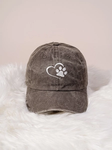 Close-up of heart and paw embroidery on vintage washed charcoal cotton baseball cap