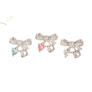 Three-piece silver bow earrings set with heart-shaped crystal studs in blue, pink and clear