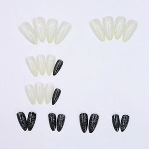 Long almond press-on nails with black and white glitter design for women 24 pieces