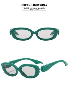 Detail view of oval green resin sunglasses with light gray lenses and thick wavy temples